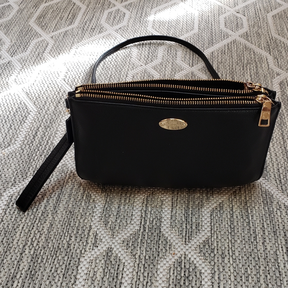 Coach black pebble  leather crossbody shoulder bag.